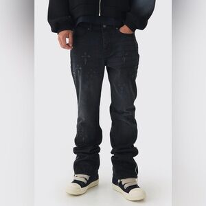 BoohooMAN Slim Rigid Flare Washed Black Denim Cross Applique Jeans
